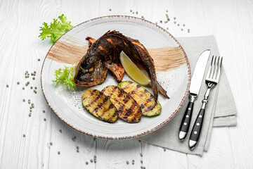 Fresh grilled dorado with zucchini