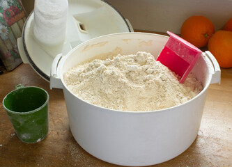 Grain Mill with Freshly Ground Homemade Flour in a Real Kitchen