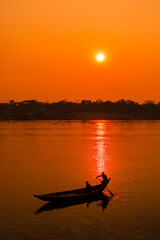 Sunset photography on the river in winter 2022. This image was taken by me on January 17, 2022, from the Doleswori river, Bangladesh, South Asia.