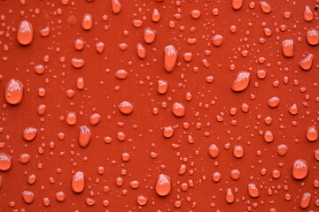 Fototapeta premium Close Waterdrops On Red Paint At Amsterdam The Netherlands 31-1-2022