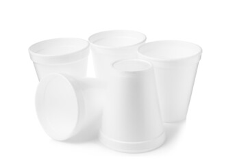Many clean styrofoam cups on white background
