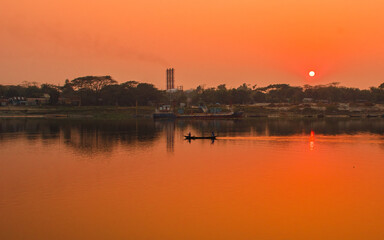 Sunset photography on the river in winter 2022. This image was taken by me on January 17, 2022, from the Doleswori river, Bangladesh, South Asia.