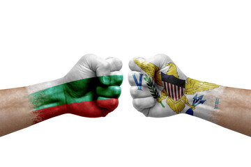 Two hands punch to each others on white background. Country flags painted fists, conflict crisis concept between bulgaria and virgin islands