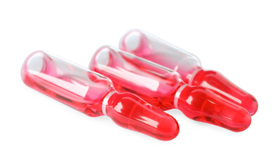 Pharmaceutical ampoules with medication on white background