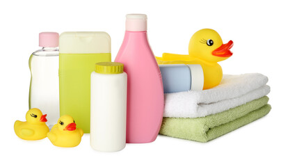Obraz na płótnie Canvas Bottles of baby cosmetic products, towels and rubber ducks on white background