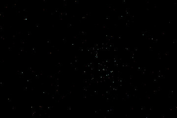 Praesepe star cluster or beehive star cluster on a dark winter night in Ohio. Also known as Messier 44 or M44 in the breast of the Cancer Constellation.