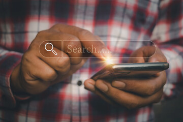 Hand man using moblie phone for Searching browsing data on the Internet online.network,media,...