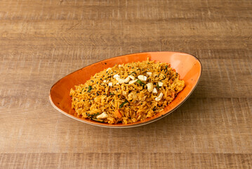 Nasi goreng is a typical rice dish of Indonesian and Malay cuisine, it is a version of fried rice, which is what it means in both languages