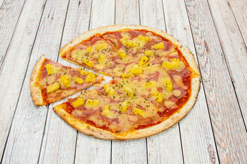 Some versions of this pizza include bacon, shrimp, cherries, red bell pepper, mushroom, onions, or jalapeños. Be that as it may, the pineapple is always present