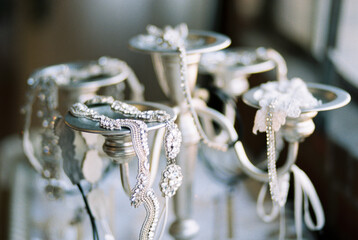 Silver Candelabra Draped in Ornate Bridal Headbands