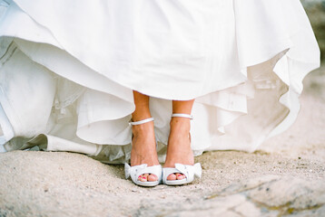 Close Up of Bride's Shoes and Bottom of Dress