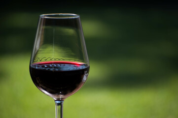 Glass of red wine close up