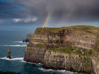 View on stunning nature scenery of Cliff of Moher, Ireland. Rainbow by O'Brien's Tower. Amazing...