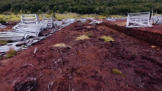 Environmental conservation. Natural impact and damage. Opencast mining of natural resources. Aerial view of an abandoned peat exploitation factory in the Andes mountains. 