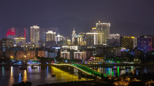 night illuminated sanya cityscape hotel complex bay panorama timelapse 4k hainan island china