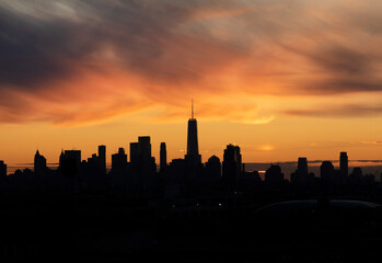 Fototapeta na wymiar Sunset Clouds Over Manhattan Skyline