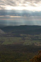 Sun Rays Shining Through the Clouds on a Overcast Fall Day in Virginia Old Rag Mountain