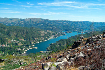Fototapeta na wymiar Water dam in the mountains valley. Gerês, north Portugal, mountains views.hiking views. 