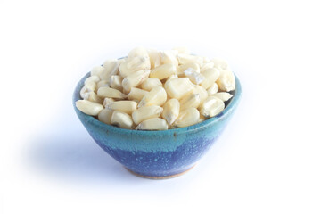 Organic Whole White Corn Kernels in Blue Pottery Bowl