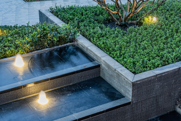 Modern residential garden landscape green plant water feature