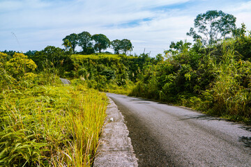 Fototapeta na wymiar Empty road through the hills