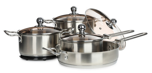 Set of stainless steel cookware on white background