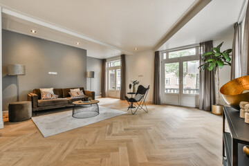 living room interior with large sofa and two floor lamps