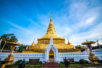 Naklejka premium Golden Chedi, Wat Phra That Chae Haeng, an old temple in Nan, Thailand, 17 July 2019