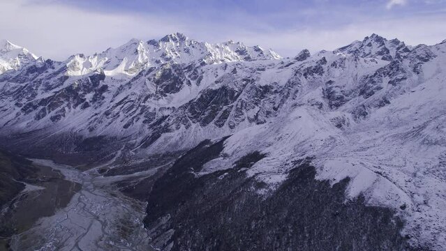 Kyanjin Valley from aerial view along the snow capped Himalayan mountains in Nepal.