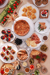 Dishes with different food on table, flat lay. Luxury brunch