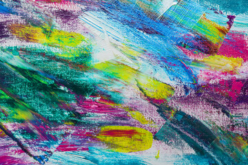 Strokes of colorful acrylic paints on canvas, closeup