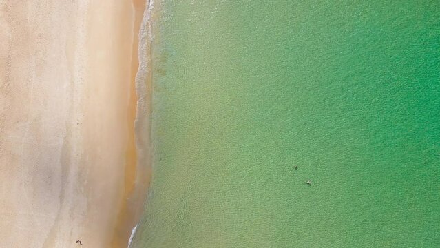 Aerial view Top-down beach sea and wood boat on sea water