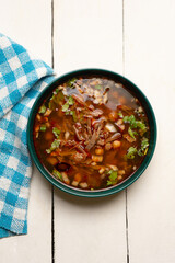 Beef birria consomme with chickpeas. Mexican food