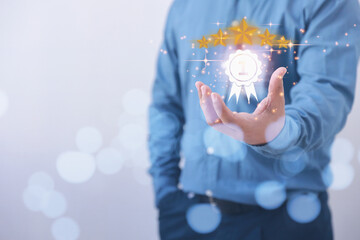 Service evaluation from customer satisfaction. Satisfaction customer to service high. A man hand of customer holding the stars to complete five stars and shows the sign of the top service quality.