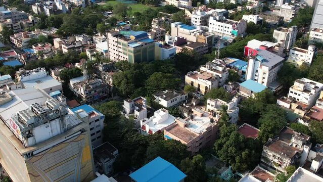 Aerial bird's eye view over T.nagar GRT in Chennai City. Thyagaraya Nagar, is a bustling shopping district with stores at budget prices, especially along Ranganathan Street.