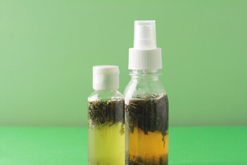 Fermented beauty products with green tea extract, holistic beauty concept, copy space