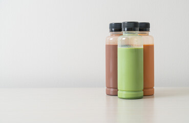 chocolate, Thai milk tea and Matcha green tea in plastic bottle