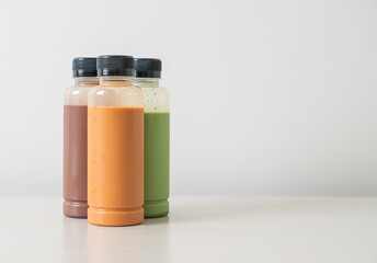 chocolate, Thai milk tea and Matcha green tea in plastic bottle