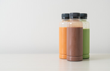 chocolate, Thai milk tea and Matcha green tea in plastic bottle