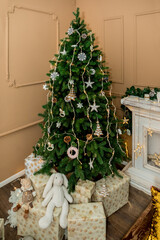 Christmas and New Year tree, toys, and brown wall (1). Idea for holiday like Christmas and New year, for covers books, magazines, articles.
