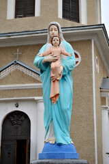 Statue of the Virgin Mary with little Jesus on the hands.