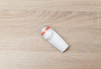 Antiperspirant stick on a wooden table