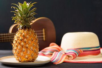Pineapple from local market on black background, summer vacation beach idea