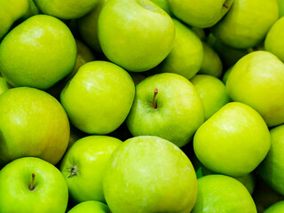 Background of ripe, juicy, green apples. Abstract background.