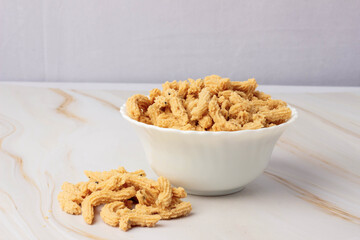 Indian snacks or soya sticks bowl in white bowl