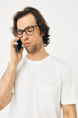 Cheerful man talking on the phone technologies isolated background