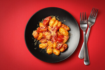 Concept of tasty food with potato gnocchi, top view