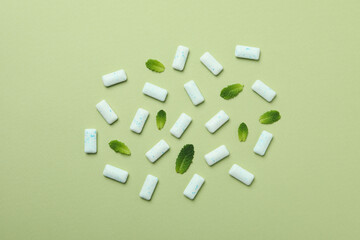 Chewing or bubble gum on green background