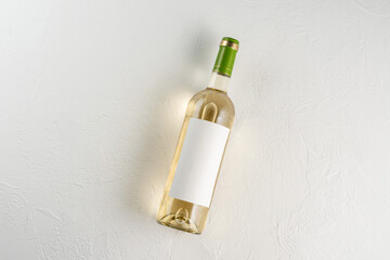 bottle of white wine on a white background. wine bottle with blank label mockup