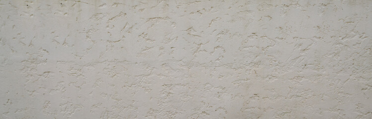 background light white gray plaster roughcast wall long in panoramic web format and header